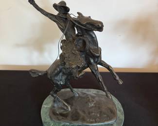 Photo 1 of 2
The Bronco Buster, by American artist Frederic Remington