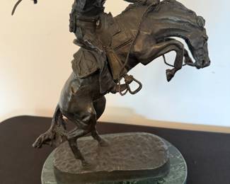 Bronze sculpture titled, The Bronco Buster