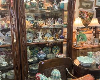 Two large curio cabinets. Client paid 15,000 each.