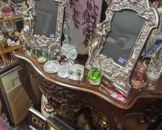 Two antique sterling vanity mirrors