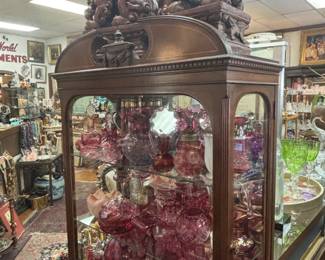 Foo dogs, many curios, cranberry glass collection