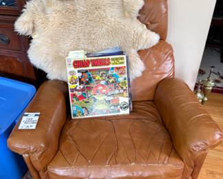Leather Chair, Records, Hats, Fur Rug
