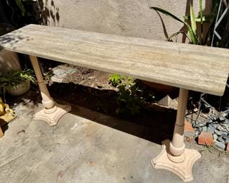 Large (and heavy) travertine pier table with antique cast iron legs. Old piece.