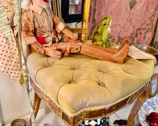Early 20th century Indonesian (?) "Pinocchio" puppet sitting atop 1920s gilt buffet chair