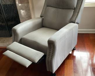 Recliner shown half way back