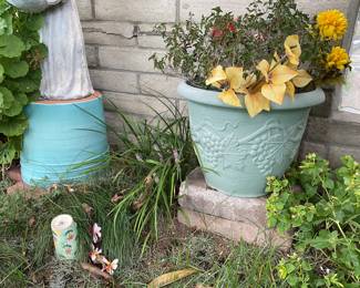 One of two soft green grape design pots, upside down aqua pot