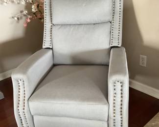Second of two matching recliners, same color just different light