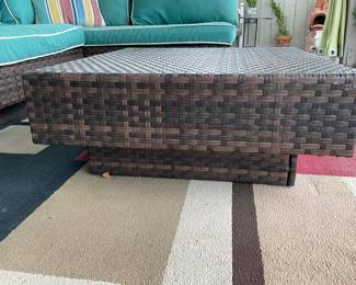 Detail of coffee table and weather resistant vinyl wicker