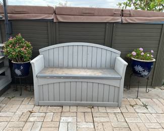Two more of the four plants in blue pots in black stands, and a storage bench, just add cushion and it looks good