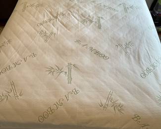 Double bed bamboo mattress sold separately from white headboard with frame