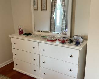 Six drawer white dresser with large mirror
