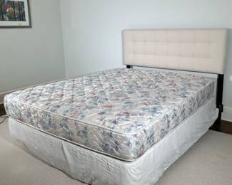 White Tufted Headboard/Bed - Queen-Sized | Queen-sized bed featuring a white tufted upholstered headboard, along with metal bedframe on caster wheels. Frame included. Mattress not included. - h. 48.5 x w. 60 in
-