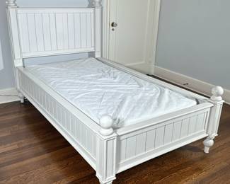 Pottery Barn Bed - Twin-Sized - 1/2 | Pottery Barn (San Francisco, California) twin-sized "Catalina" bed frame in painted white, featuring turned legs, oversized wooden knobs, headboard, footboard, and side rails. Mattress not included. Additional Measurements: Inside: w. 33.5" x d. 77". Platform: h. 12". Footboard: h. 32" - h. 42 x w. 42 x d. 80 in