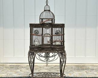 Tuscan Style Cast Iron Birdcage | Vintage (2000s) Tuscan style ornate cast iron birdcage, featuring a domed top and hinged door. - h. 70 x w. 29 x d. 17.5 in