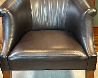 Stickley Furniture Co. Leather Club Chair | Stickley Furniture Company (Manlius, New York) dark brown leather club chair with a traditional design, wraparound arms, and smooth wood legs. - h. 31.5 x w. 21.5 x d. 28 in