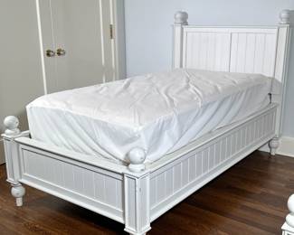 Pottery Barn Bed - Twin-Sized - 2/2 | Pottery Barn (San Francisco, California) twin -sized "Catalina" bed frame in painted white, featuring turned legs, oversized wooden knobs, headboard, footboard, and side rails. Mattresses not included. Additional Measurements: Inside: w. 33.5" x d. 77". Platform: h. 12". Footboard: h. 32". - h. 42 x w. 42 x d. 80 in