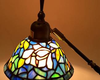 Tiffany Style Floor Lamp | Tiffany-style floor lamp, featuring a stained glass lamp shade with a floral pattern, sturdy base/column and an adjustable arm for directing light. - h. 55 x w. 9 in