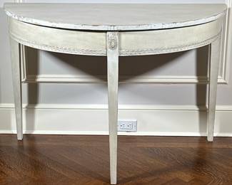 Neoclassical Style Demilune Table - 1/2 | Antique (19th century) Swedish/Baltic Neoclassical style white-painted demilune consoles, with square tapering channelled legs topped by detailed motif panels. Lot 80 and 81 tables can connect to make a round table. - h. 30 x w. 44.5 x d. 22 in