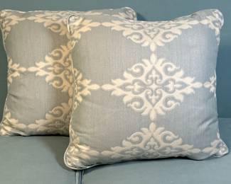 (2pc) Throw Pillows - Light Blue Floral | Two square reversible throw pillows in light blue fabric with white floral pattern reaching both sides of the pillow. - w. 17 in