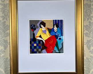 Itzchak Tarkay (Israeli, 1935-2012) Serigraph - "Sisters" | Original artwork depicting two elegant sisters lounging about in bright colors. Serigraph on paper. Framed in gold frame and matted . Signed by artist: lower right corner. Artwork size: 9.25" x 9.25" - h. 24 x w. 20 in (Frame)