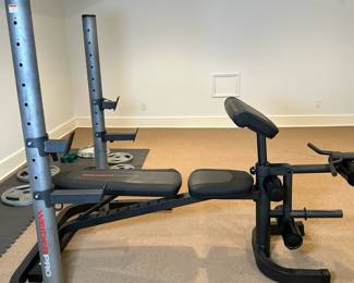 Weider Pro Weight Bench & Rack | Weider Pro weight bench and rack featuring an adjustable-height rack, multi-position bench, and leg developer station with padded rollers.