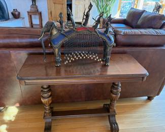 Vintage Indian Dhokra elephant with Lord Ram sculpture; antique oak table