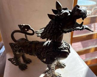 One of a pair of antique Tibetan temple guardian foo dogs