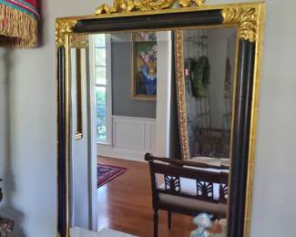 A gold and black mirror is always lovely.