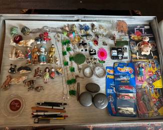 chalkware dolls, pens, brooches, etc