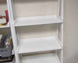 Two White Ladder Type Storage Shelves