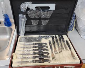 Never used complete set of eating utensils in briefcase