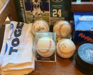 Sports items including some sign baseball 
