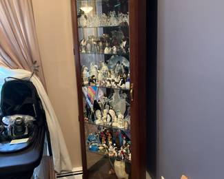 Traditional corner curio cabinet glass front