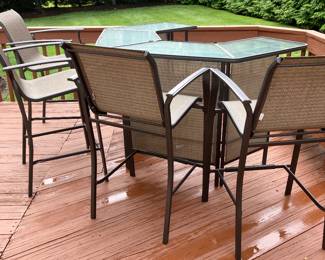 Out door bar height patio set with four chairs  can be used indoors also for recreation room 