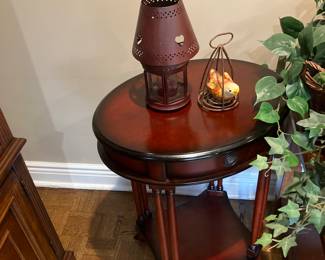 Traditional round wood, accent and tables lower with lower shelf