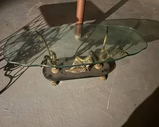 Glass and metal base table 