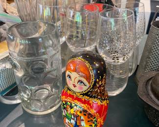 Russian nesting dolls and glassware 