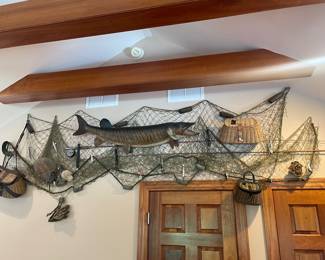Mounted musky and fishing net scene 