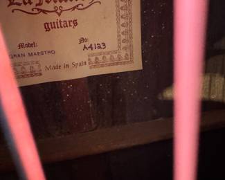 Accoustical guitars in cases that 'The Golden Girls' played on La Mancha gran Maestro made in Spain A4123