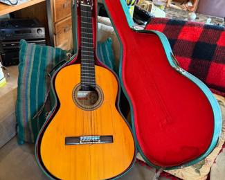 Accoustical guitars in cases that 'The Golden Girls' played on