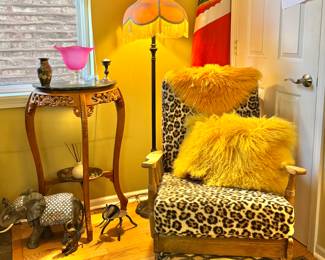 mission style rocking chair, recovered in a fun, leopard print fabric