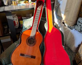 Accoustical guitars in cases that 'The Golden Girls' played on