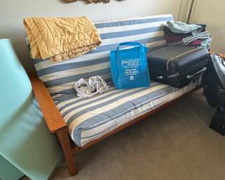 Futon. Perfect for college dorms or small spaces.