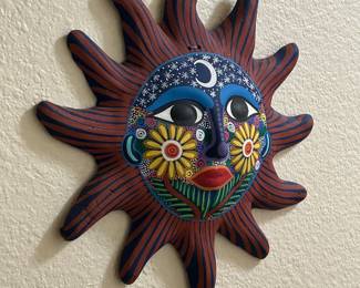 Clay Sun Face. 