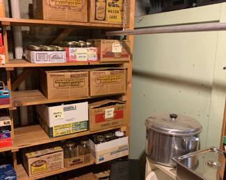Canning jars and plastic freezer boxes, canning tools and supplies