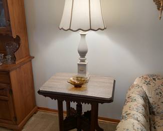 Marble top antique table; pair of white lamps; mid-century glass