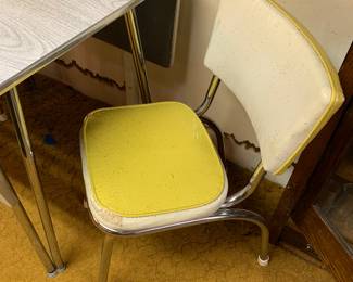 Vintage formica top chrome kitchen table and rough yellow chairs