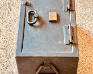 Antique cast iron strong box and if you buy it, you'd better be, too!