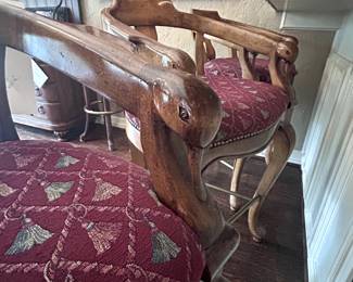 Upholstered Bar Stools with beautifully carved duck heads.