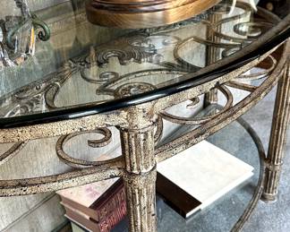 Beautiful distressed Iron sofa table with heavy beveled glass top.
